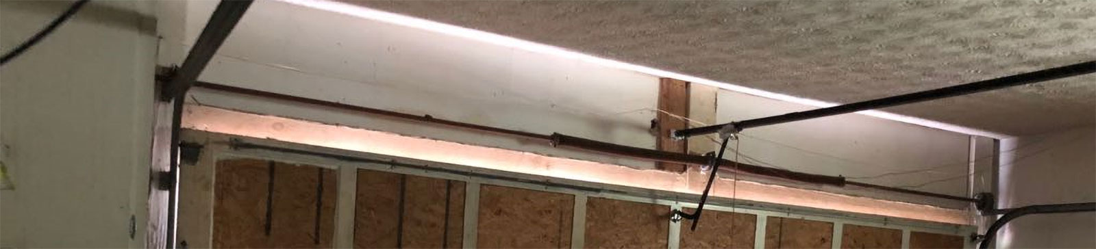 Damaged Garage Door Panels Before Replacement – South Salt Lake