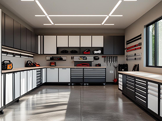 Contemporary Taylorsville garage featuring sleek custom cabinets, organized tools, and bright natural lighting
